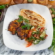 tandoori chicken cucumber salad and naan