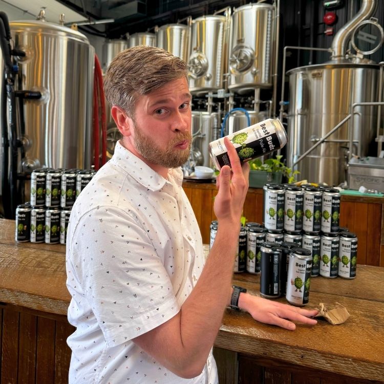 Ryan from Liquor Plus showcasing the Best Budz Pale Ale at Herald Street Brewing