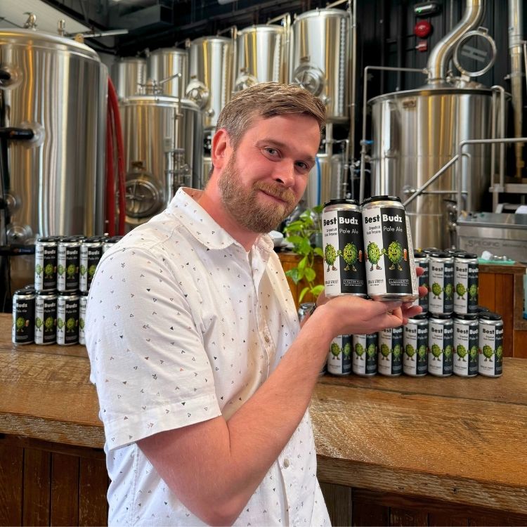 Ryan from Liquor Plus showcasing the Best Budz Pale Ale at Herald Street Brewing